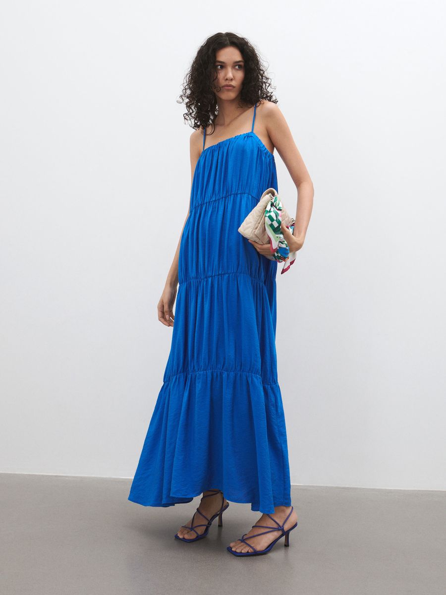 Cobalt Blue Maxi Dress with spaghetti straps and gathered tiering detail.