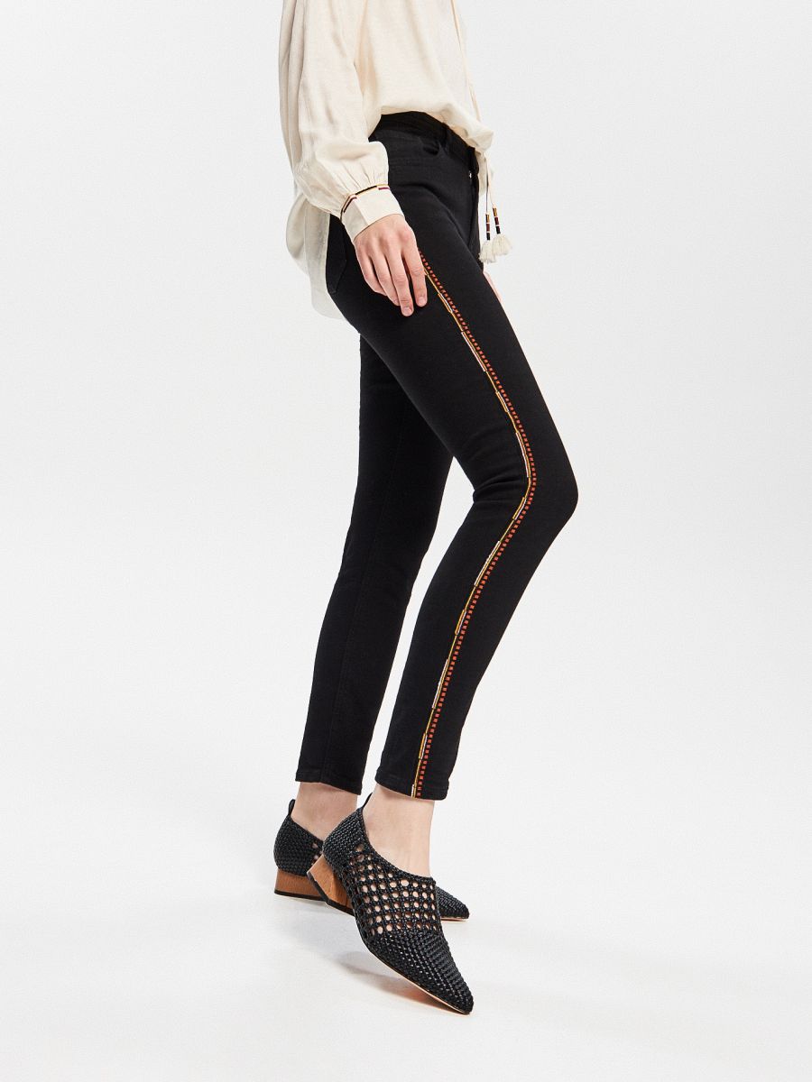 jeans with black side stripe